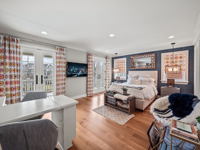 457 Catalpa Dr, Birmingham, MI 48009 - bedroom featuring french doors, ornamental molding, access to exterior, multiple windows, and recessed lighting