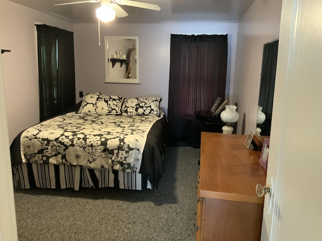 carpeted bedroom featuring a ceiling fan