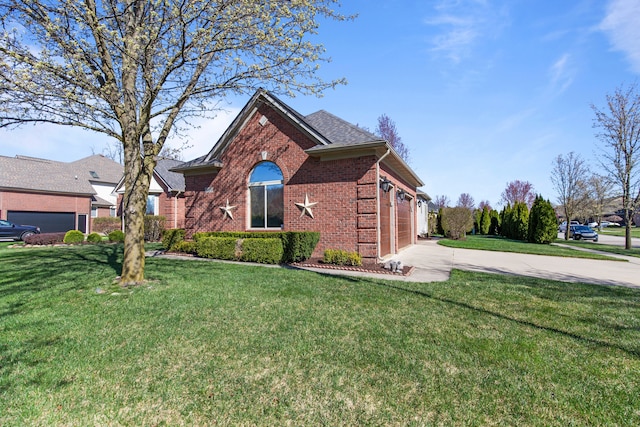 view of front of home featuring brick siding, a garage, a front lawn, and concrete driveway