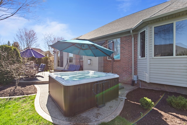 view of patio with a hot tub