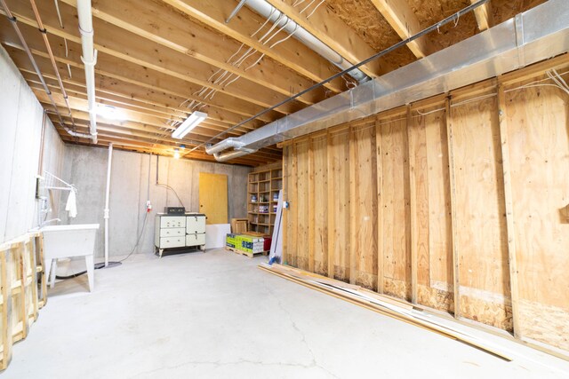 333 Quarterline St, Newaygo, MI 49337 - unfinished below grade area featuring a sink