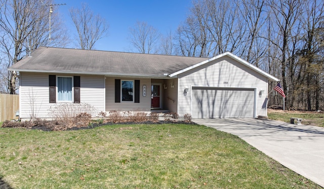 333 Quarterline St, Newaygo, MI 49337 - ranch-style house with fence, concrete driveway, a front lawn, and a garage