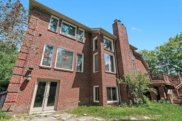 view of building exterior with stairway