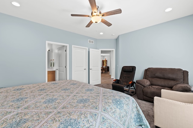 bedroom featuring recessed lighting, visible vents, a ceiling fan, and ensuite bathroom
