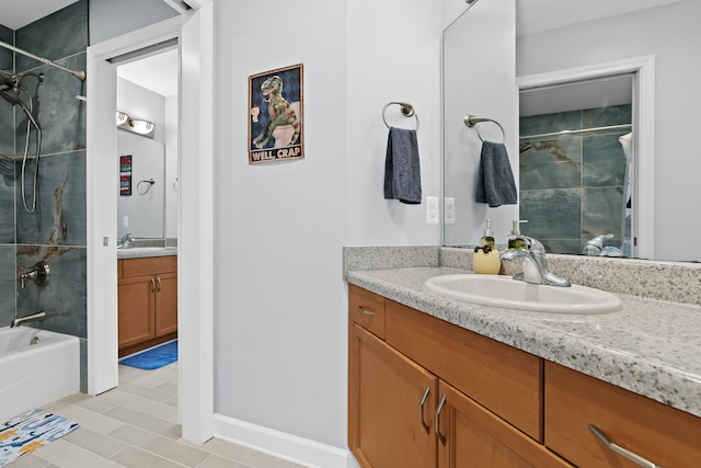 bathroom with tile patterned floors, vanity, and tub / shower combination