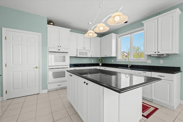 48491 Inveraray Rd, Canton, MI 48188 - kitchen with white appliances, dark countertops, white cabinetry, and light tile patterned floors