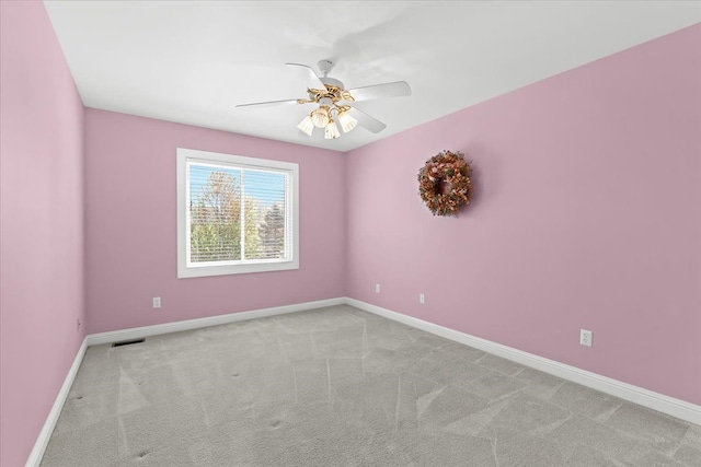 48491 Inveraray Rd, Canton, MI 48188 - spare room with a ceiling fan, baseboards, and light carpet