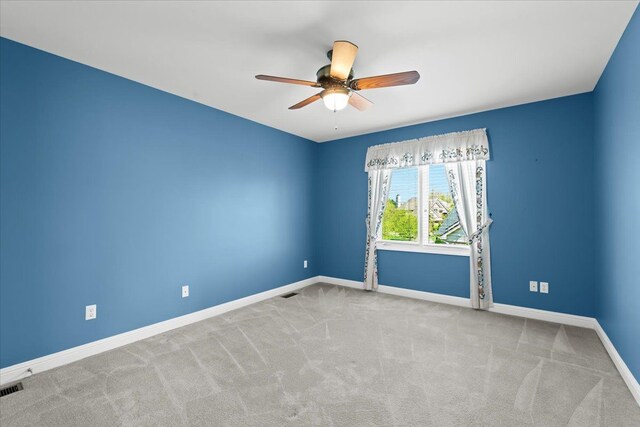 48491 Inveraray Rd, Canton, MI 48188 - unfurnished room featuring ceiling fan, baseboards, and carpet floors