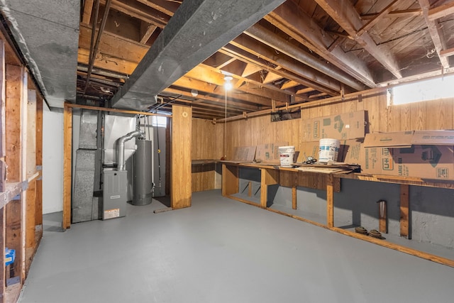 26488 Stollman Dr, Inkster, MI 48141 - basement with water heater, a workshop area, and heating unit