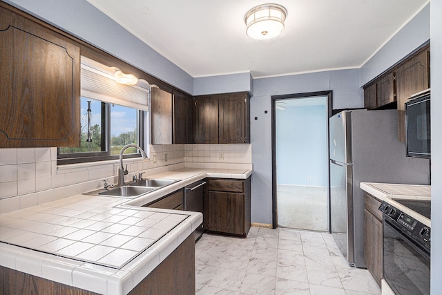 92 Brookfield Dr, Oxford, MI 48371 - kitchen featuring electric range, dark brown cabinets, a sink, tile countertops, and black microwave