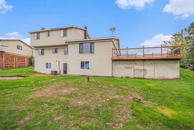 92 Brookfield Dr, Oxford, MI 48371 - back of property with a chimney, a wooden deck, a lawn, and central air condition unit
