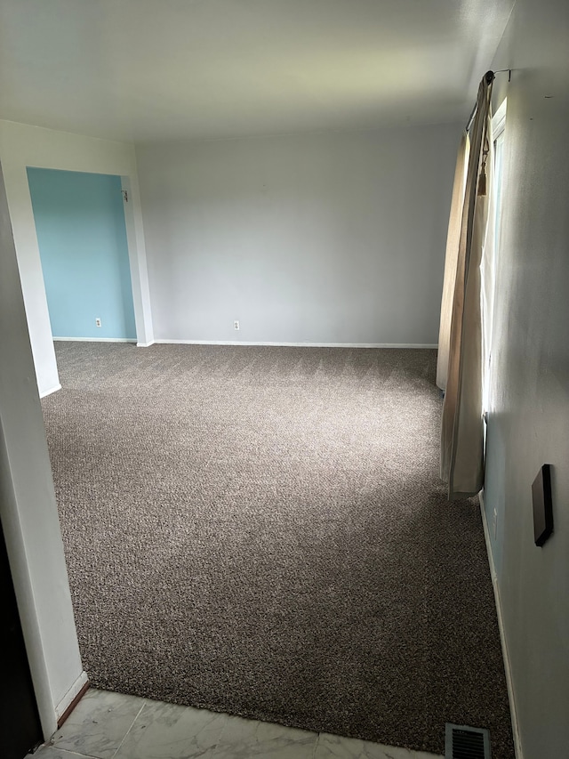 92 Brookfield Dr, Oxford, MI 48371 - empty room featuring baseboards and carpet floors