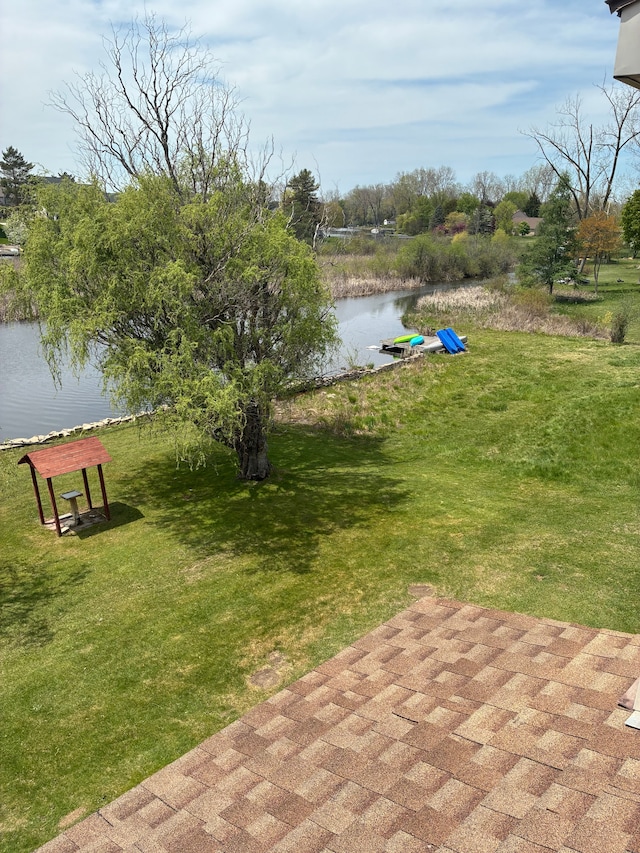 92 Brookfield Dr, Oxford, MI 48371 - view of home's community featuring a water view and a lawn
