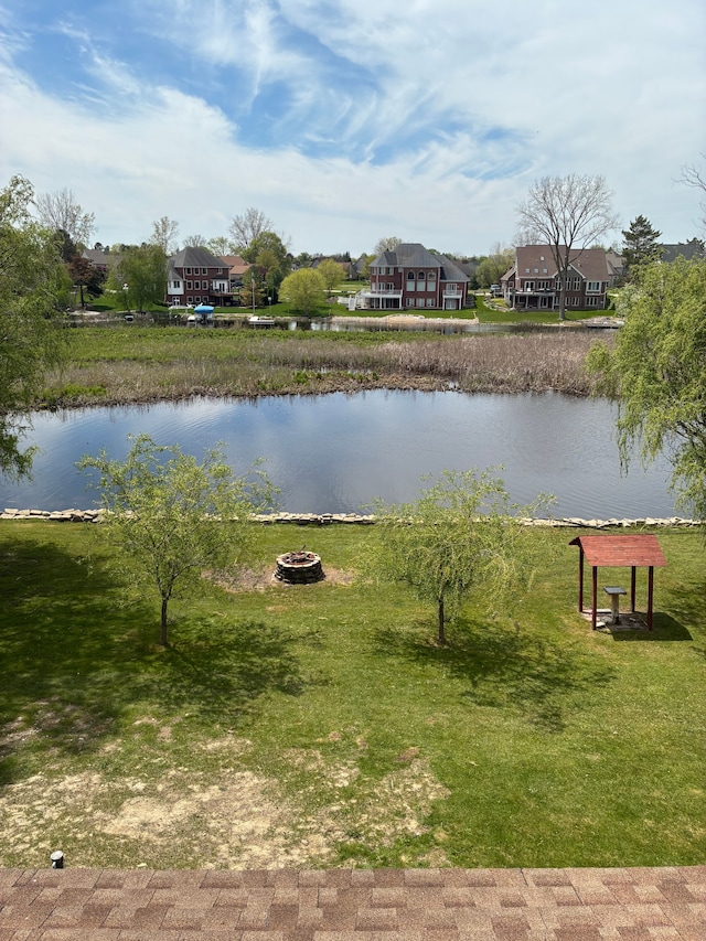 92 Brookfield Dr, Oxford, MI 48371 - water view featuring an outdoor fire pit