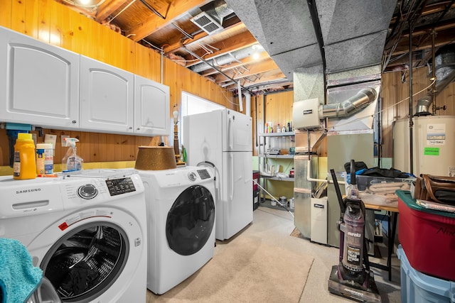 19737 Clement Rd, Northville, MI 48167 - washroom with cabinet space, washing machine and dryer, and water heater