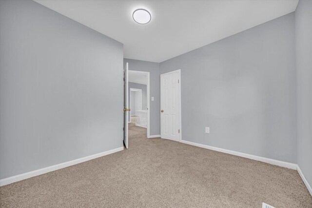 408 Mount Vernon St, Detroit, MI 48202 - unfurnished bedroom with baseboards and carpet flooring