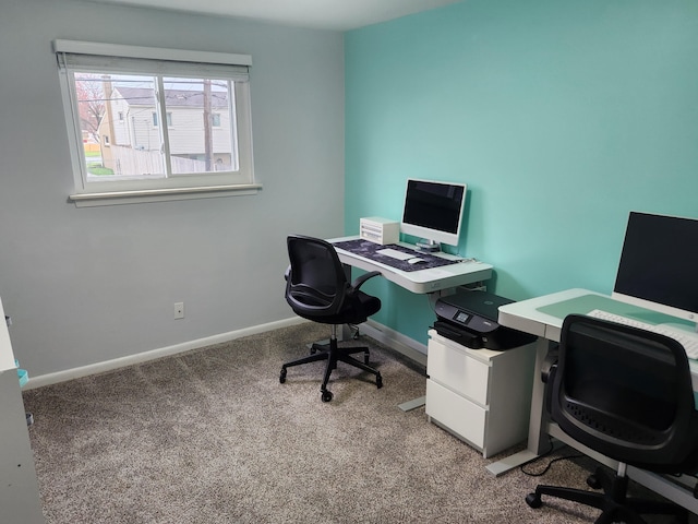 office featuring baseboards and carpet