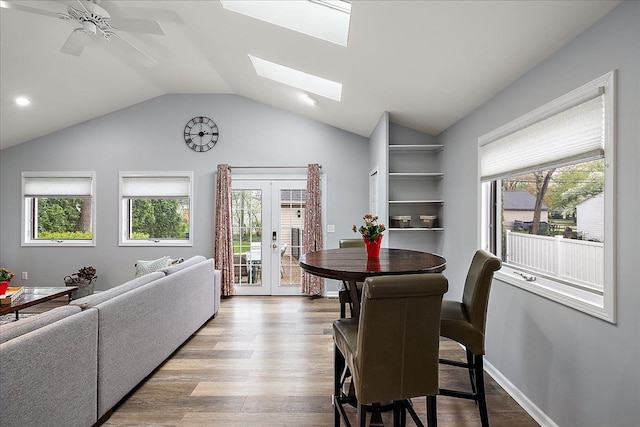 interior space featuring french doors, wood finished floors, and a wealth of natural light