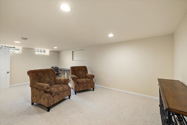 sitting room featuring recessed lighting, baseboards, and light carpet