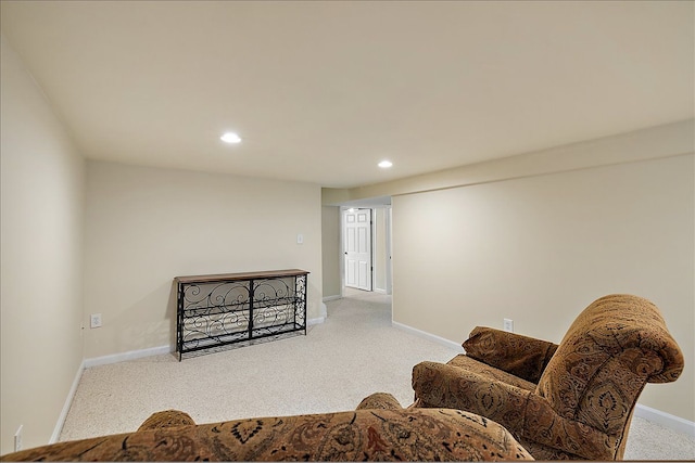 sitting room with baseboards, carpet, and recessed lighting