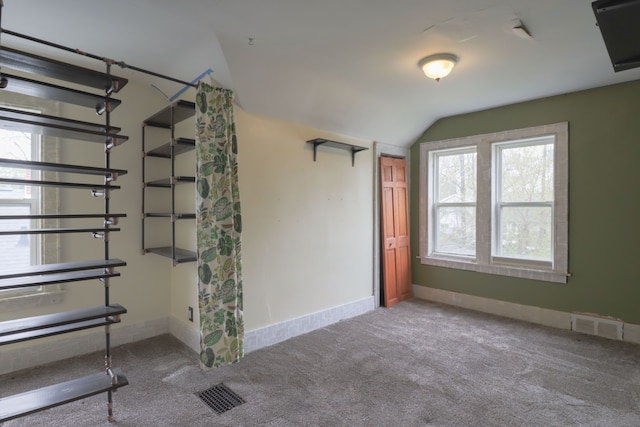 324 Albany St, Ferndale, MI 48220 - staircase featuring vaulted ceiling, carpet, and baseboards