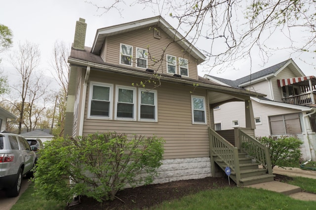 324 Albany St, Ferndale, MI 48220 - view of front of house with a chimney