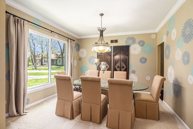 dining space with baseboards, a healthy amount of sunlight, and light carpet