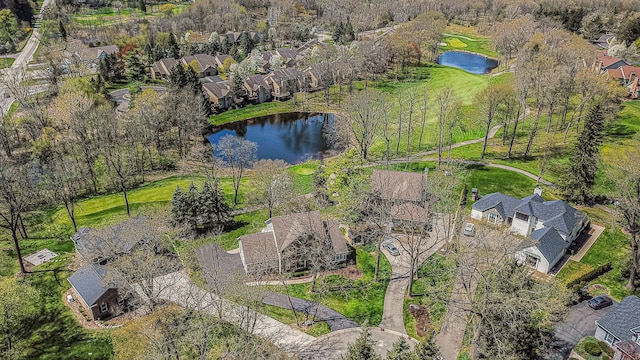 bird's eye view with a residential view and a water view