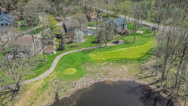 aerial view featuring a water view and view of golf course