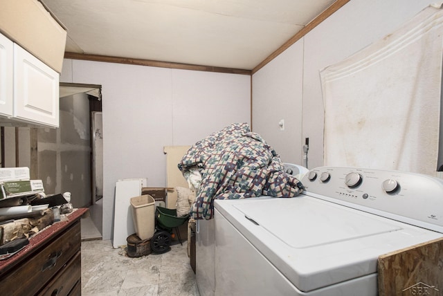 laundry area with washer / dryer and cabinet space