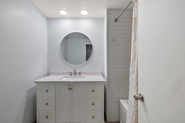 bathroom featuring vanity and bathing tub / shower combination