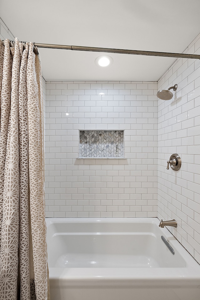 full bathroom featuring shower / bathtub combination with curtain