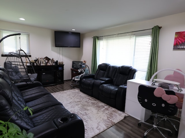 living room with recessed lighting and dark wood finished floors