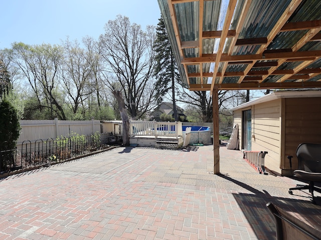 view of patio with fence