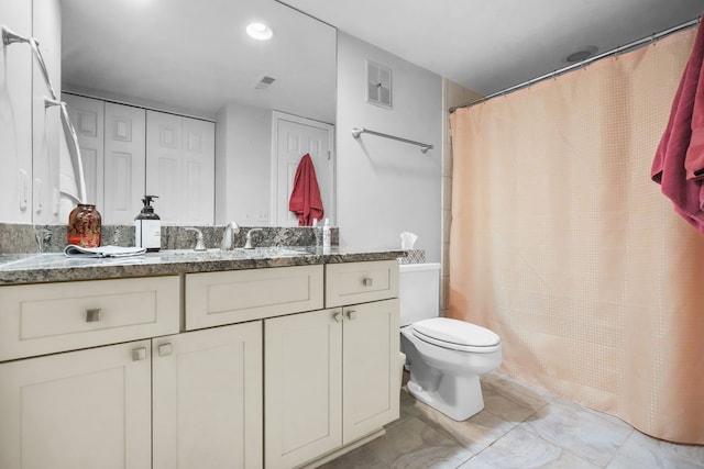 3553 Port Cove Dr Unit 37, Waterford, MI 48328 - bathroom featuring toilet, visible vents, vanity, and a shower with shower curtain