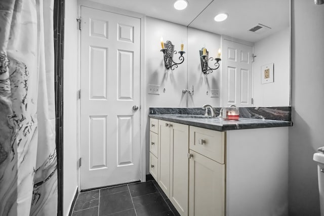 3553 Port Cove Dr Unit 37, Waterford, MI 48328 - bathroom with tile patterned floors, visible vents, a shower with shower curtain, and vanity