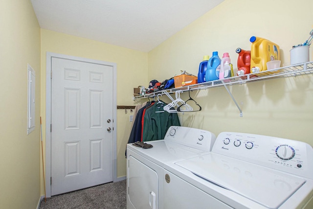 washroom with carpet floors, washer and clothes dryer, baseboards, and laundry area