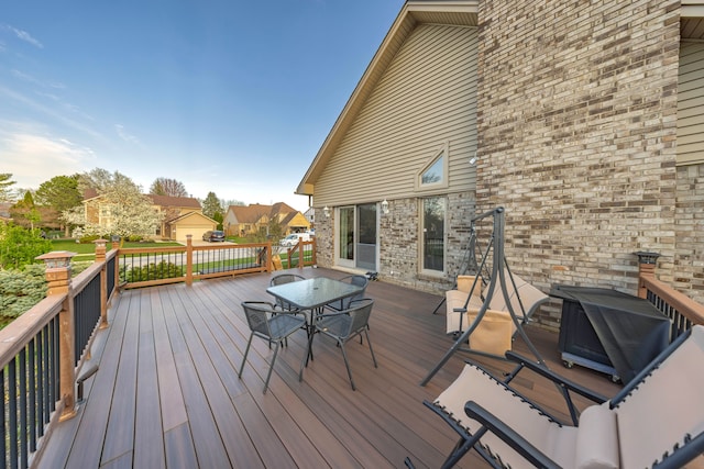 deck featuring outdoor dining area