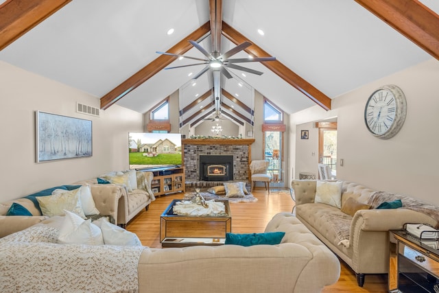 living room featuring beam ceiling, a fireplace, recessed lighting, a ceiling fan, and visible vents