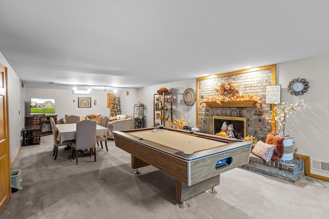 recreation room with carpet floors, pool table, visible vents, and a brick fireplace