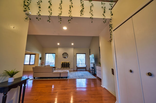 3052 Westman Ct, Bloomfield Hills, MI 48304 - living area featuring hardwood / wood-style flooring, recessed lighting, and high vaulted ceiling