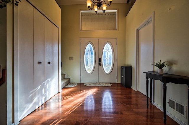 3052 Westman Ct, Bloomfield Hills, MI 48304 - entrance foyer with stairway, hardwood / wood-style flooring, french doors, a notable chandelier, and visible vents