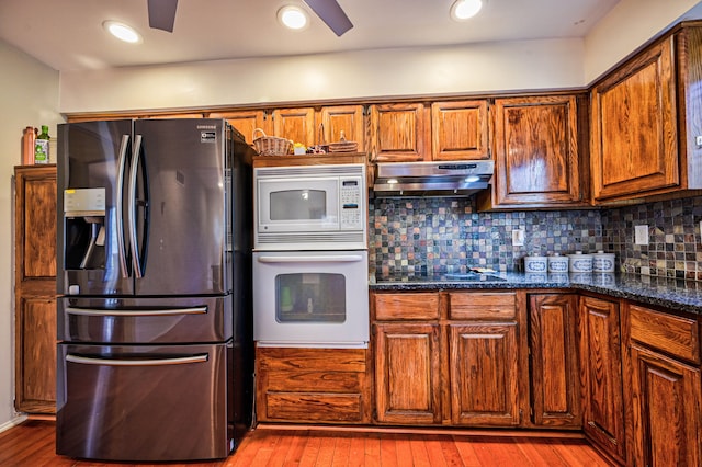 3052 Westman Ct, Bloomfield Hills, MI 48304 - kitchen with hardwood / wood-style flooring, ceiling fan, white appliances, and ventilation hood