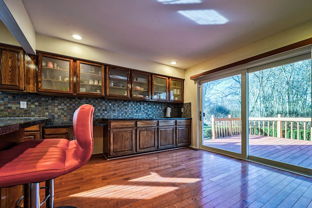 3052 Westman Ct, Bloomfield Hills, MI 48304 - bar with recessed lighting, dark wood-style floors, and decorative backsplash