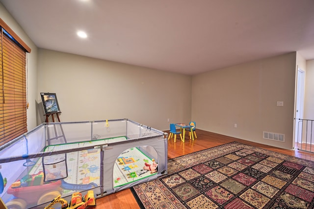 3052 Westman Ct, Bloomfield Hills, MI 48304 - rec room with recessed lighting, wood finished floors, and visible vents