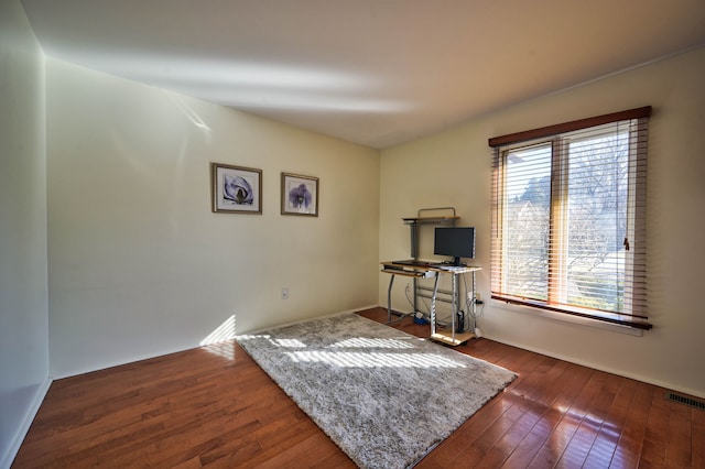 3052 Westman Ct, Bloomfield Hills, MI 48304 - interior space featuring baseboards, dark wood-style flooring, and visible vents