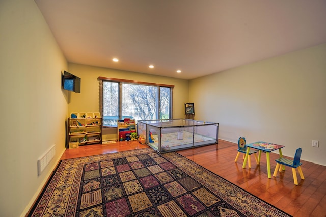 3052 Westman Ct, Bloomfield Hills, MI 48304 - recreation room with visible vents, wood finished floors, and recessed lighting