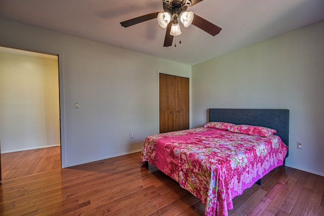 3052 Westman Ct, Bloomfield Hills, MI 48304 - bedroom with hardwood / wood-style flooring, baseboards, a ceiling fan, and a closet