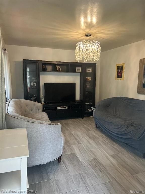 41541 Mcbride Ave, Van Buren, MI 48111 - living room featuring a chandelier and light wood finished floors