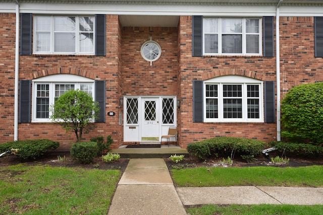 multi unit property featuring brick siding